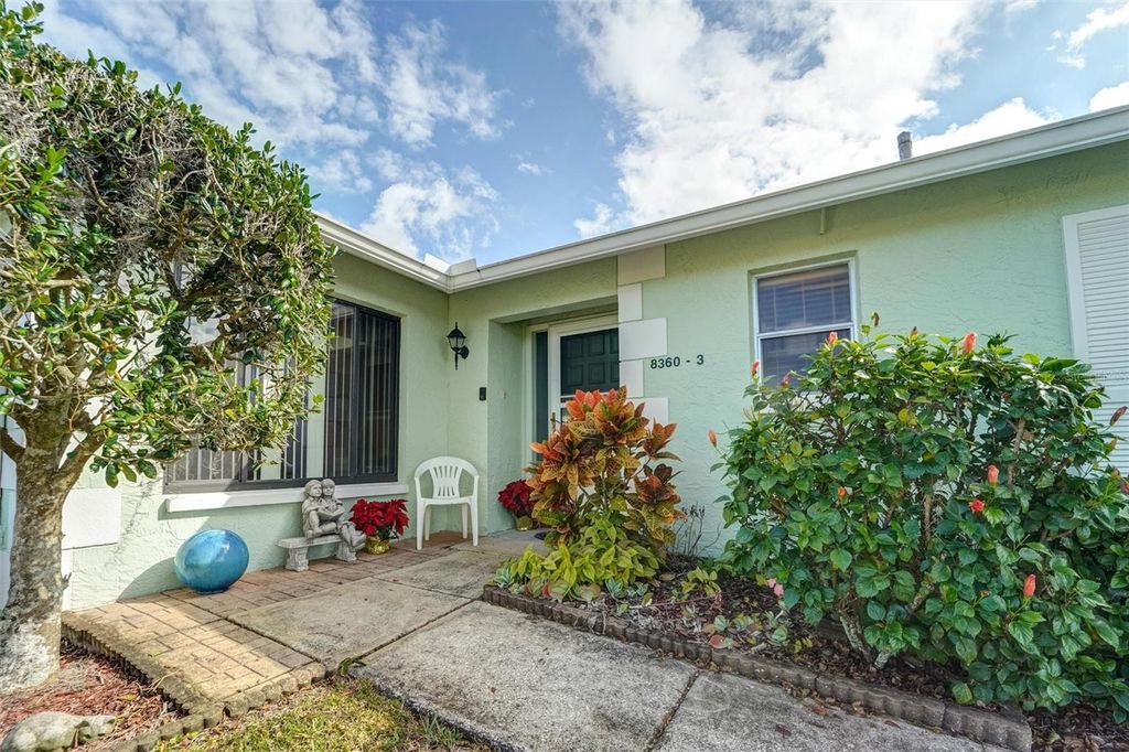 Photo of 8360 High Point Circle #3, Port Richey, FL 34668 (MLS # W7881922)