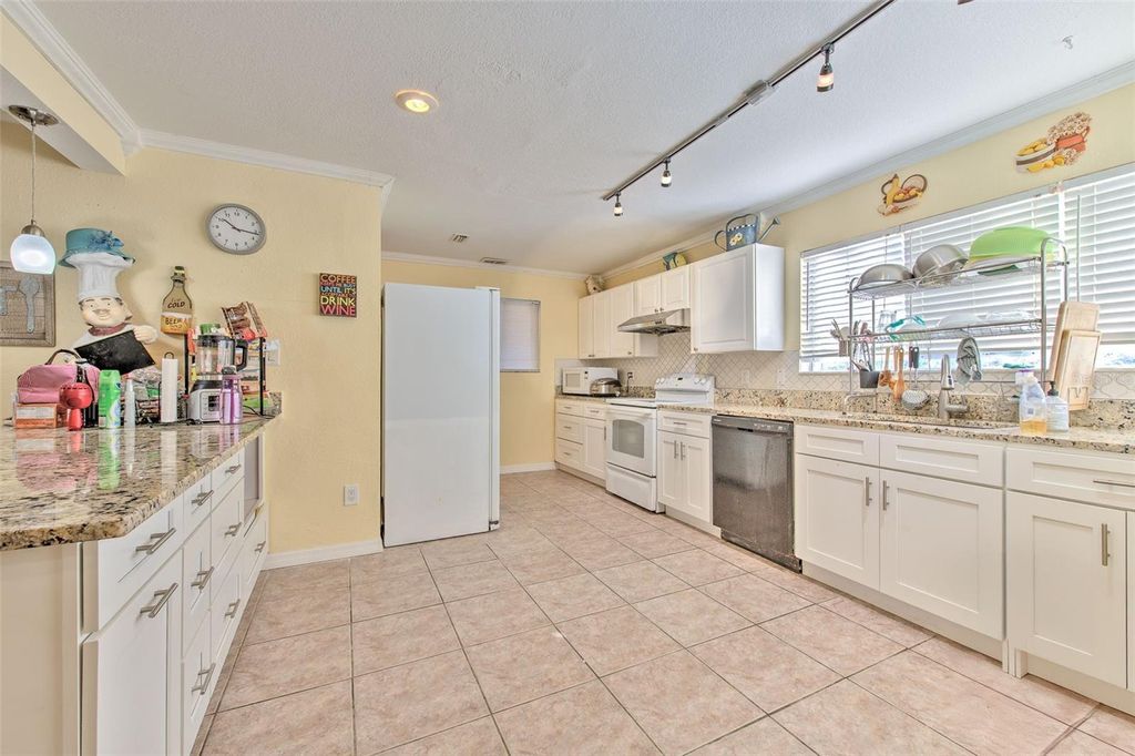 Photo of 5415 Miles Boulevard, Port Richey, FL 34668 (MLS # TB8442649)