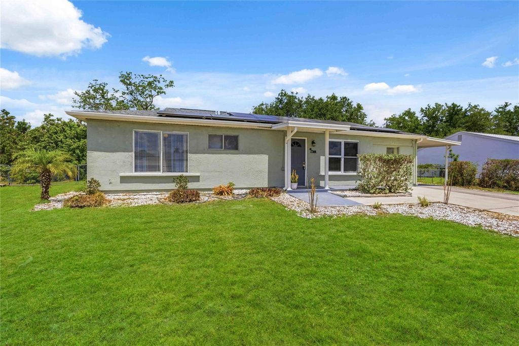 Photo of 2419 Roxbury Circle, North Port, FL 34287 (MLS # O6406806)