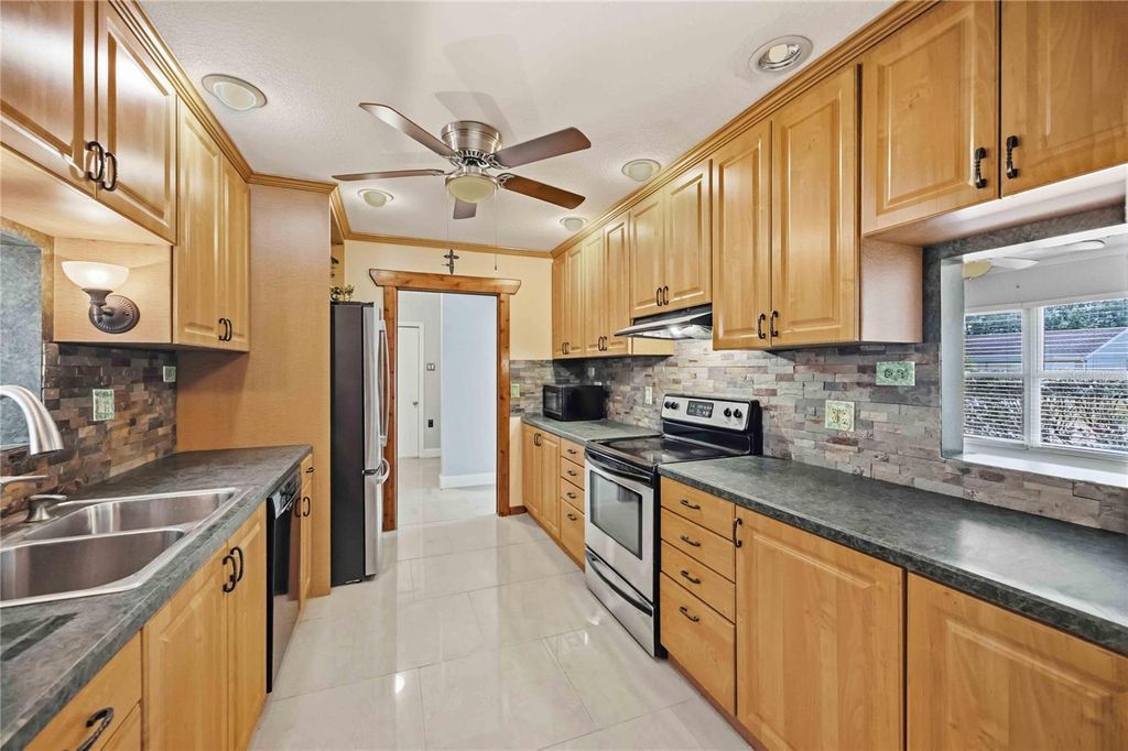 Photo of 2419 Roxbury Circle, North Port, FL 34287 (MLS # O6406806)