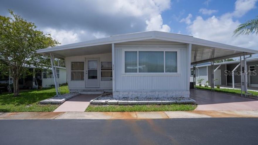 Reduced to sell and set in Westwind—a resident-owned Dunedin community known for simplicity and value—this inviting 1-bed, 1-bath home pairs a bright, flexible layout with a turnkey beach-town lifestyle (furniture conveys as shown) and low carrying costs: the $150/month HOA fee covers ground/lawn maintenance, trash pickup, and full access to community amenities, including a year-round temperature-regulated pool, an active clubhouse with a calendar of events, and an updated outdoor recreation area. Inside, easy-care laminate flooring connects a comfortable living/dining area to a practical kitchen with matching appliances and abundant cabinetry; the large east-facing Florida sunroom—currently used as a second bedroom—welcomes morning light and doubles as guest space, office, or sunny lounge, while a spacious primary bedroom and a full bath with shower/tub combo and ceramic tile complete the plan. Minutes to shopping, dining, entertainment, and the sugar-sand beaches of Honeymoon Island, this Westwind home is ready to welcome you for the season or all year—with the comfort, convenience, and low-maintenance Florida living today’s buyers are searching for.
