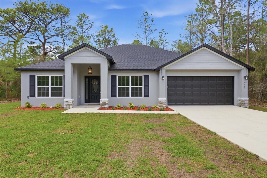 You're going to love this beautifully designed NEW CONSTRUCTION home situated on 1.30 acres in Crystal Manor. Enjoy NO HOA fees & lots of privacy in this serene setting. With soaring 12 ft ceilings and an open floor plan, this 4 bedroom, 2 bath home encases warmth & simplicity with its stylish fixtures, tones & natural light. Upon entering to the left, french doors enclose a 4th bedroom, office or flex space. Formal dining to the right opens to the spacious kitchen - fully equipped with stainless steel appliances, solid wood cabinets, granite countertops w/ an eat in bar-top, that extends right into the family room. The open concept is great for family gatherings and entertaining, while the split floor plan offers privacy. There's plenty of room to store your RV, boat or other toys, and even add a pool. High & dry, no flood zone! Crystal Manor is known for its peaceful, laid-back lifestyle. Paved roads and low-traffic streets are perfect for biking, evening walks, or walking the dog, while Lake Rousseau is just minutes away for boating, fishing, and waterfront recreation. Residents enjoy year-round access to boating, fishing, kayaking, paddle boarding, hiking, and biking, with close proximity to Lake Rousseau, the Gulf of Mexico, and the world-famous Crystal River - home to the iconic manatees. Schedule a tour today!