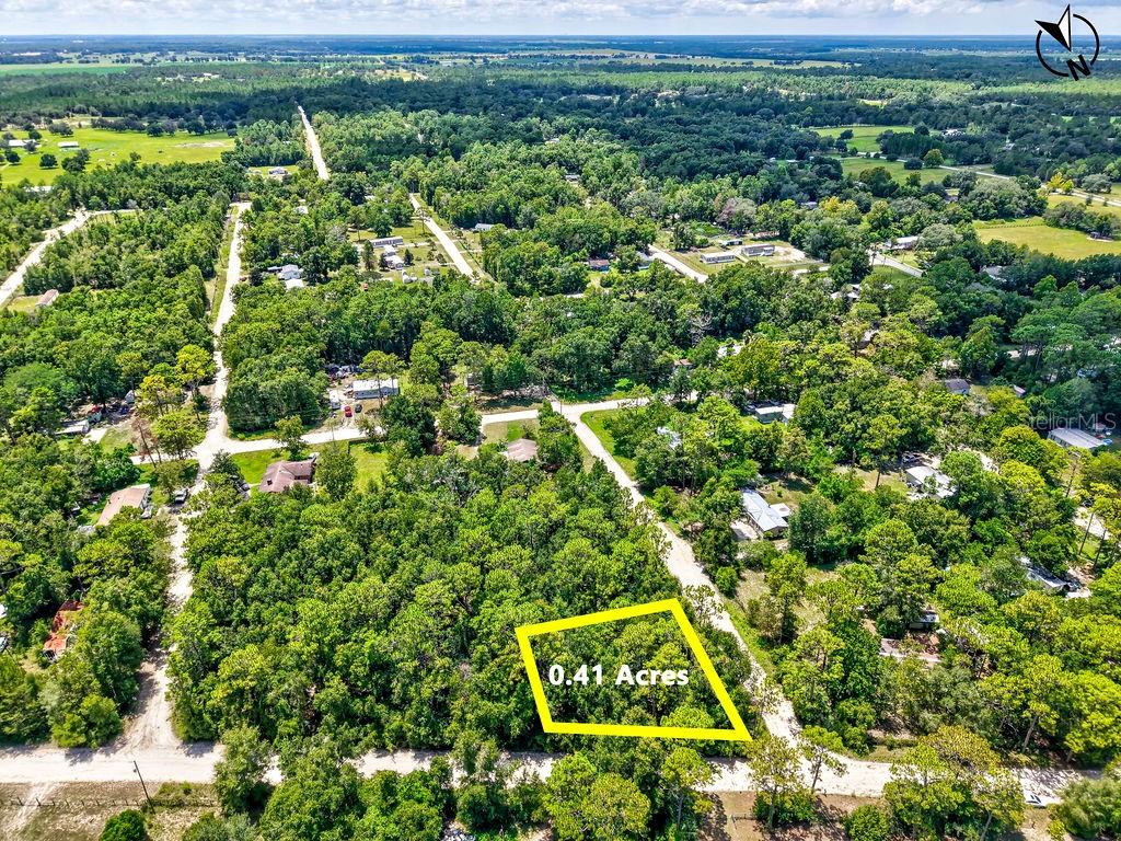 Escape the city and enjoy the freedom of country living with this 0.41-acre vacant lot just outside the charming town of Williston. Perfect for your future home, weekend getaway, or investment, this property offers a peaceful setting surrounded by the beauty of rural Florida. You’ll be just minutes from downtown Williston, known for its small-town charm, local shops, and restaurants, while still enjoying quick access to Gainesville, Ocala, and the Gulf Coast. Outdoor enthusiasts will love being close to Cedar Lakes Woods & Gardens, Devil’s Den Spring, and the Goethe State Forest, offering endless opportunities for diving, hiking, and exploring nature. With its convenient location and relaxing atmosphere, this lot is a great place to build your dream lifestyle. Call for more details today!!