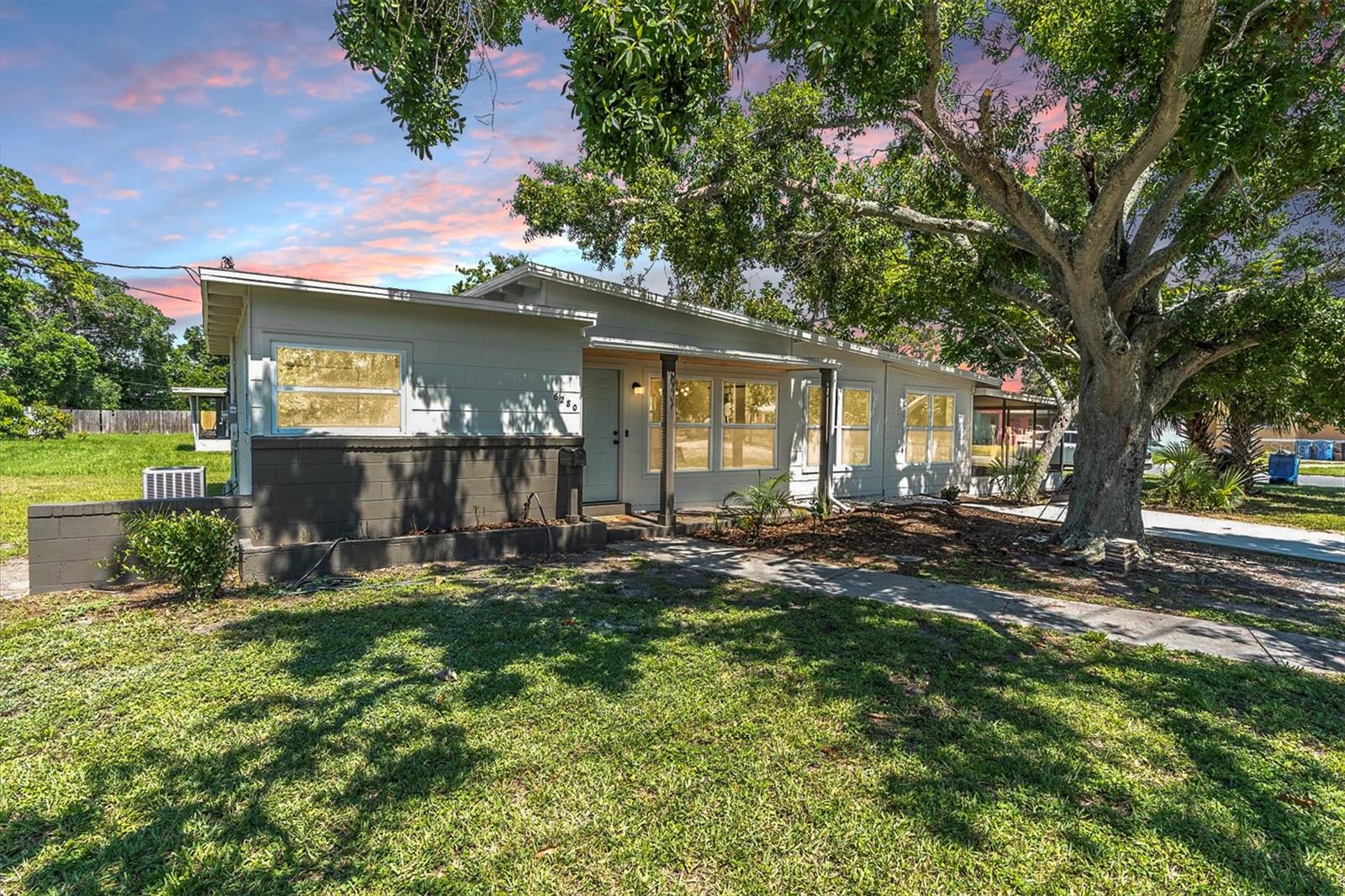 Welcome to 6280 Dr. Martin Luther King Jr. St S, a beautifully updated gem offering modern comfort and style in one of St. Petersburg’s most convenient and rapidly growing neighborhoods. This stylish 2-bedroom, 1-bath home has been completely renovated from top to bottom — all you need to do is move in and enjoy!
Step inside to a bright, open floor plan featuring brand new luxury vinyl plank flooring throughout the main living areas and porcelain tile flooring in the kitchen. The updated kitchen boasts sleek finishes and an efficient layout that flows seamlessly into the living and dining areas — perfect for entertaining.
The contemporary bathroom includes a dual-sink vanity and updated fixtures, while the indoor laundry room with a sliding barn door adds both convenience and charm.
Upgrades include a brand new roof, all new ductwork, new windows, fresh interior and exterior paint, and a new driveway — giving the home a fresh, modern feel with lasting value.
Step outside to a large screened-in patio, ideal for outdoor dining, relaxing, or hosting guests year-round.
Fantastic location — just minutes from Downtown St. Petersburg, Boyd Hill Nature Preserve, Lake Maggiore, and Gulfport’s vibrant waterfront district. You’ll also enjoy easy access to I-275, the Skyway Bridge, St. Pete Beach, and a wide range of dining, shopping, and entertainment options.
This is a rare opportunity to own a fully renovated home in one of South St. Pete’s most convenient and desirable areas. Schedule your private tour today!