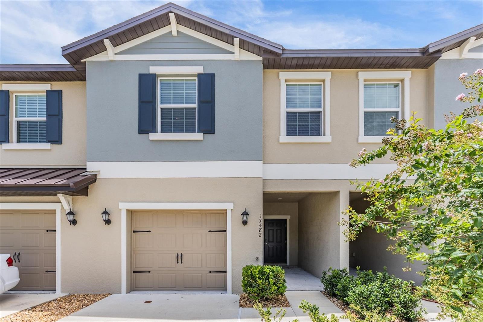 Step into modern luxury with this beautifully designed St. Thomas model townhome, built in 2023 by Lennar Homes and located in the highly sought-after master-planned community of Angeline in Land O’ Lakes. Backing up to serene conservation views, this two-story townhome offers style, space, and comfort.
The first floor features an open-concept layout with a spacious living room, dining area, and a well-appointed kitchen—perfect for entertaining or relaxing. Step out to the covered patio and enjoy peaceful moments surrounded by nature.
Upstairs, a versatile loft space connects two secondary bedrooms and the private owner’s suite, tucked into its own corner of the home. The owner’s retreat includes a luxurious en-suite bathroom and a generous walk-in closet.
Located within the innovative Angeline community, residents enjoy access to over 3,600 acres of green space, 100 miles of trails, a community farm, and plans for a crystal-clear recreational lagoon with beachfront activities. Angeline will also be home to the state-of-the-art H. Lee Moffitt Cancer Center and Speros FL STEM magnet school, making it a vibrant and forward-thinking place to call home.
Whether you're a first-time buyer or simply looking for a lifestyle upgrade, this home is a perfect blend of comfort, convenience, and community. It's Not Just a HOME... BUT A FULL LIFESTYLE!