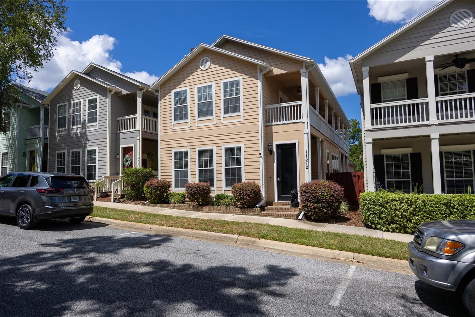 Welcome to this beautifully maintained home in the highly sought-after Fletcher’s Mill Charleston Park community. This 3-bedroom, 2.5-bathroom residence blends comfort, convenience, and style—an ideal opportunity to own in one of Gainesville’s most desirable locations. Step inside to a bright, functional layout with soaring ceilings, neutral finishes, and abundant natural light. The spacious living room flows effortlessly into the dining area and kitchen, creating a seamless space for both everyday living and entertaining. The kitchen offers ample cabinetry, a breakfast bar, and direct access to the patio—perfect for outdoor dining or relaxing. The split-bedroom design provides privacy, with the primary suite conveniently located on the first floor. This retreat features a walk-in closet and an en-suite bath with dual sinks and a walk-in shower. Upstairs, two additional bedrooms share a Jack & Jill bath, along with a versatile loft-style living area and a charming balcony accessible from every room. Perfectly situated in NW Gainesville, the home offers quick access to I-75, UF, Shands Hospital, North Florida Hospital, Tioga Town Center, shopping, dining, and top-rated schools. The Charleston Park neighborhood enhances the lifestyle with tree-lined streets, sidewalks, and a warm, welcoming community atmosphere. Don’t miss your chance to call this home.Schedule your private showing today!