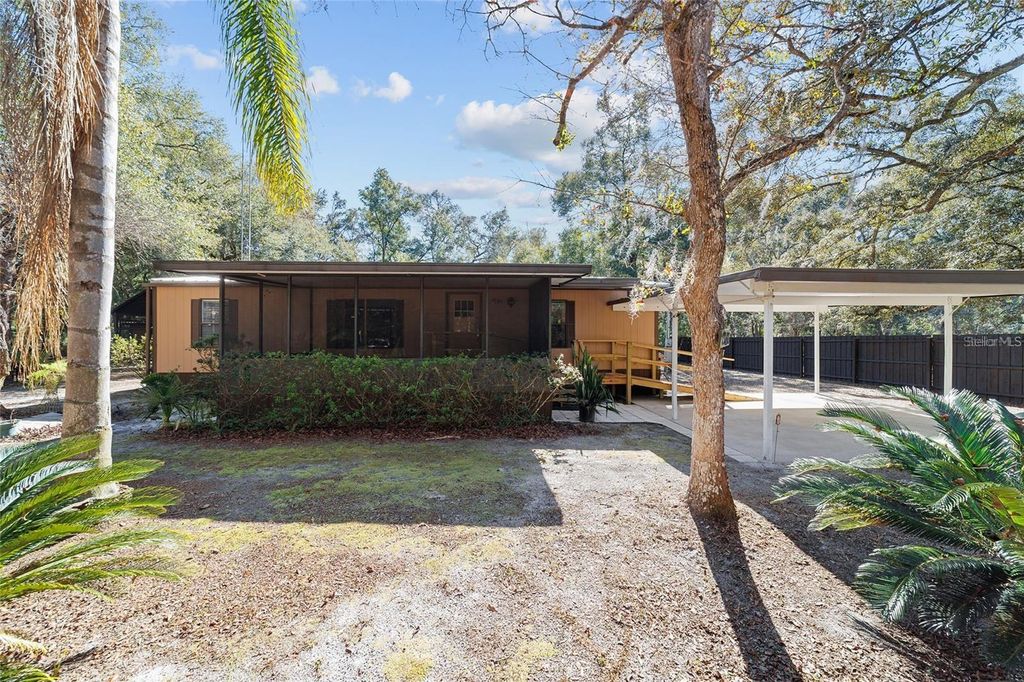 Photo of 13168 NE 19th Lane, Silver Springs, FL 34488 (MLS # OM715208)