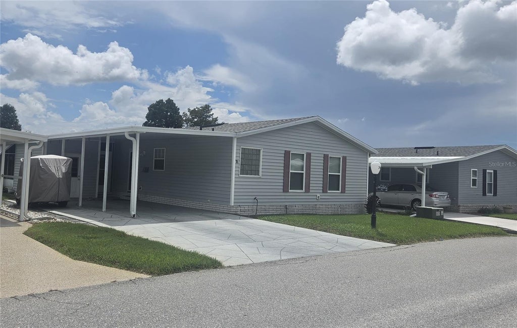 Photo of 76 Straphmore Drive, Haines City, FL 33844 (MLS # P4939761)