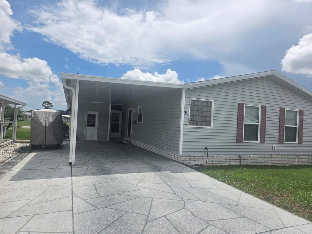 Photo of 76 Straphmore Drive, Haines City, FL 33844 (MLS # P4939761)