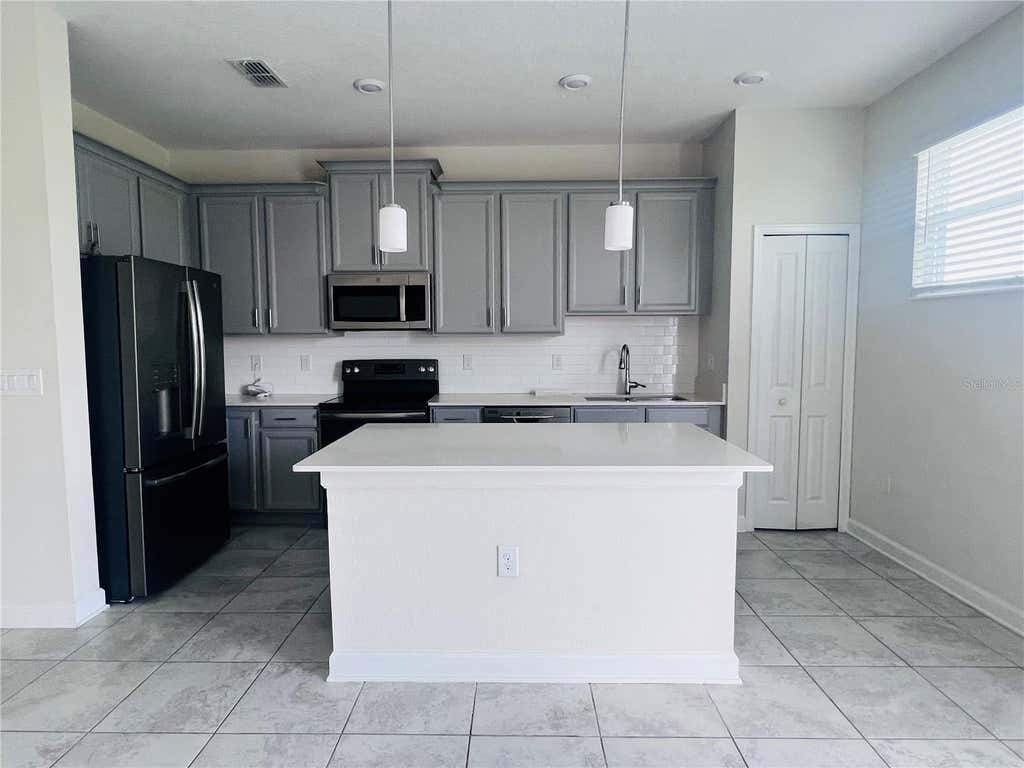 Photo of 4894 Tribute Trail, Kissimmee, FL 34746 (MLS # S5151277)