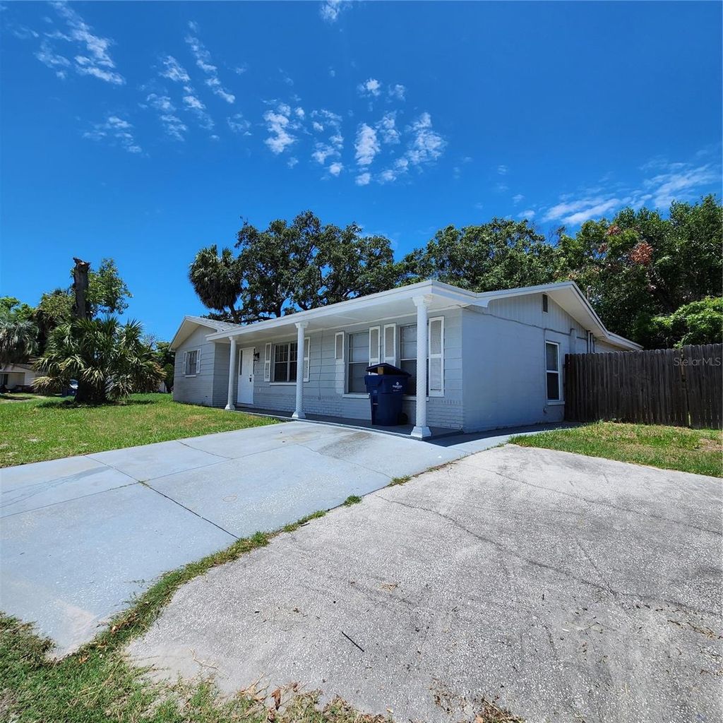 Photo of 3249 Pinehurst Drive, Holiday, FL 34691 (MLS # TB8469256)