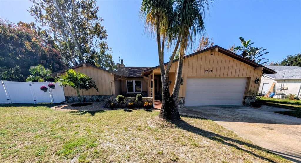 Photo of 9532 Sunshine Boulevard, New Port Richey, FL 34654 (MLS # TB8561040)