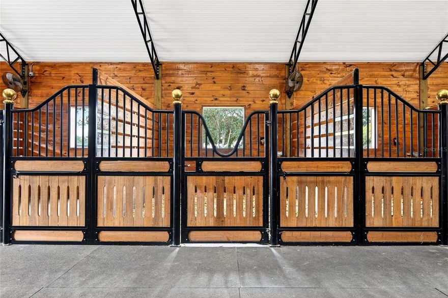 One or more photo(s) has been virtually staged. Under Construction. Still time to Pick your Colors! Welcome to this gorgeous gated 10 acre Turn Key Equestrian Estate where luxury living meets world class functionality. currently under construction, this farm and Barndominium will include: 40 x 150 Horse Barn with Cupolas and covered porches designed with the Lux Horse & Rider in mind! 10-12 Stalls with European Stall Fronts, beautifully stained Tongue & Groove walls, Auto Waters, Fans & Dutch Windows, 16 ft Aiselway with all mats, Board Fenced perimeter plus 8 individual paddocks., Barn ceilings and walls with Insulated Ceiling. climate controlled Feed Room, Tack Room, Custom indoor Grooming Stall, 2 Wash Racks with Hot & Cold. Barn Bathroom / Laundry room. 150 x 250 All weather arena with Irrigation plus 30 x 48 Hay / Equipment Storage with 12 ft walls + 2 Quarantine Stalls and or revenue option with RV Hookup. Designed by a Show Jumper and Rider / GC that knows how to layout a functional high end horse farm. The attached 3/2 residence is nothing short of amazing with high end finishes, elevated 12" ceilings, multiple porches for overlooking arena or horses, custom oversized Kitchen with island, Stone countertops, Porcelain Tile Floors and more! There is also still room to build another residence now or down the road should you choose to do so. Interior pics are of another Barndo farm that has recently completed and indicative of the stye and finishes, subject to change without prior notice. No expense spared with underground utilities and hand designed Gated Stone Entrance, your dream farm awaits! Don't settle for renovations for your legacy place whether it will be your primary or secondary - we know exactly how elevated riders live, work and dream! Only 15 miles to The World Equestrian Center!