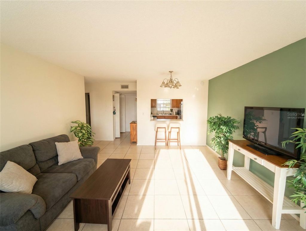 Photo of 2856 Somerset Park Drive #102, Tampa, FL 33613 (MLS # O6371702)