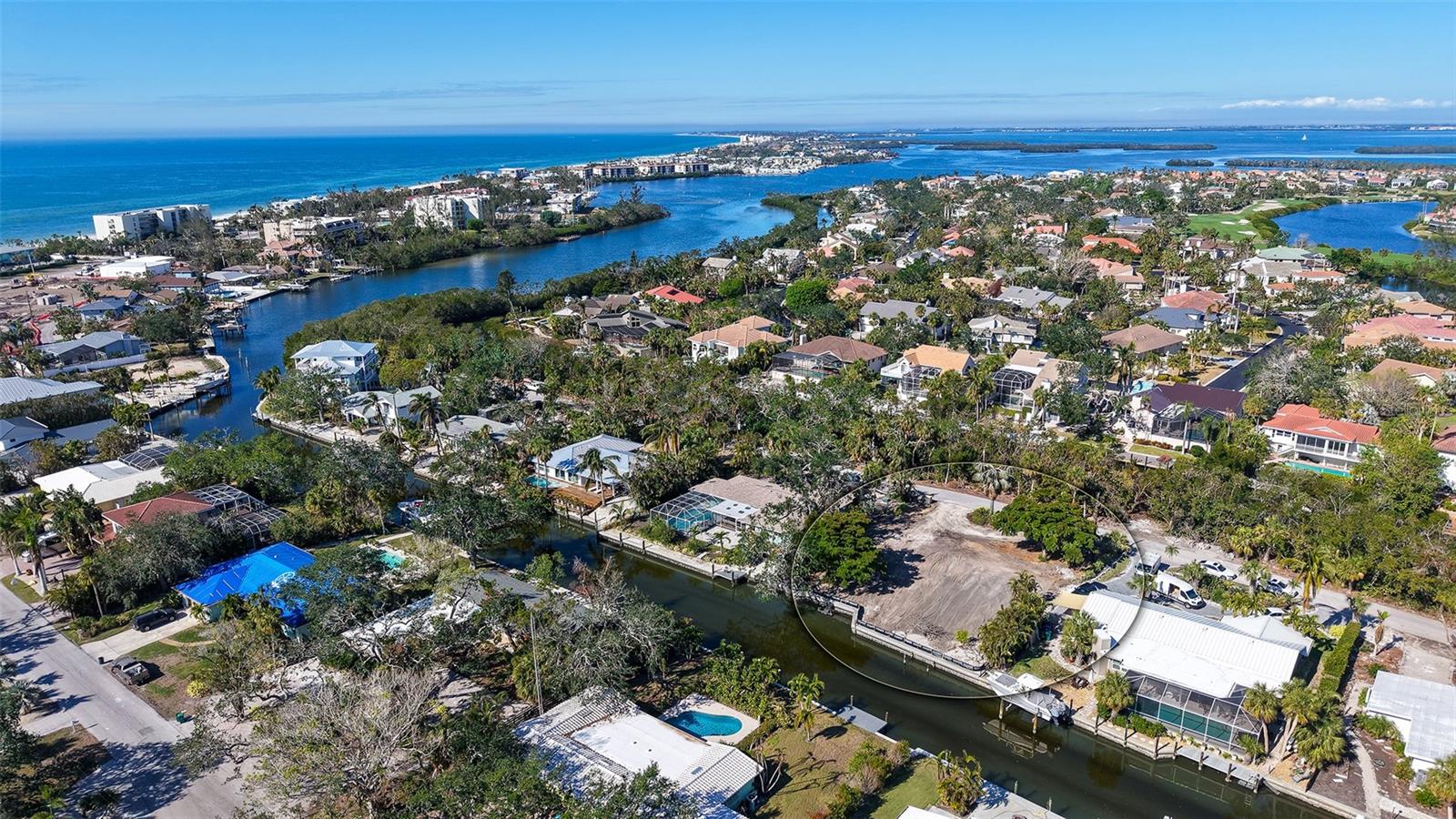 ESTATE SIZE BUILDABLE LOT 100' X 140' HOUSE TORN DOWN & SALT WATER CANAL FRONT LOT CLEARED & READY TO BUILD YOUR DREAM HOME IN DESIRABLE BUTTONWOOD HARBOUR NEIGHBORHOOD. Rare south end of Longboat Key location ( Sarasota County ) vacant lot with seawall situated Mid Longboat Key. Buttonwood Harbour neighborhood also has its own Boat Basin/Marina with community docks available for boats up to 28 feet with easy access & no bridges to Sarasota Bay & Gulf of Mexico access. The close by neighborhood beach offers miles of gorgeous crystal sand beach & magnificent sunsets where neighbors congregate nightly to toast their good fortune!