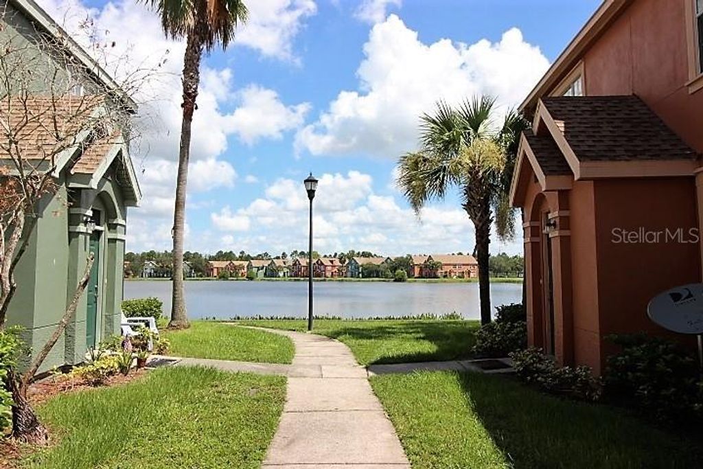 Photo of 9738 Lake Chase Island Way, Tampa, FL 33626 (MLS # TB8334220)