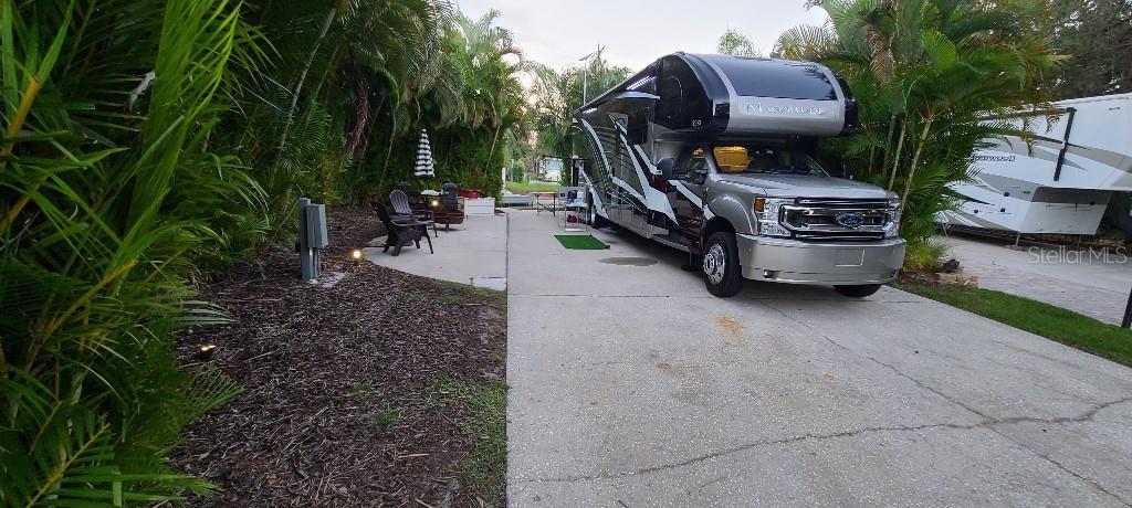 Welcome to your privately gated, dream RV lot With PRIVATE DOCK that is located at 443 Waterway Drive, River Ranch, FL! This exceptional waterfront lot is situated within the River Ranch RV Resort, offering an unparalleled RV living experience. Nestled in the heart of River Ranch, this lot provides a serene and picturesque setting perfect for relaxation and recreation. The resort is known for its beautiful landscaping, well-maintained grounds, and community atmosphere. The lot's waterfront location offers stunning views and direct access to the water, enhancing the tranquility and beauty of your RV living experience. One of the standout features of this property is its private dock. Imagine starting your day with a peaceful morning on the dock, sipping coffee while watching the sunrise over the water. The dock offers easy access for fishing, kayaking, boating, or simply enjoying the water. This private amenity is perfect for outdoor enthusiasts and adds significant value to the property. The lot at 443 Waterway Drive is spacious and versatile, providing ample room for your RV and additional outdoor living space. The lot includes full sewer hookups, water, and two separate power hookups of 30 and 50 amp electric on the left and right sides of the pad site. Whether you envision a cozy fire pit area, or a barbecue setup for entertaining, this lot can accommodate your dreams. The flexibility of the lot allows you to personalize it to fit your lifestyle and preferences. River Ranch RV Resort offers a wide array of amenities to enhance your living experience. Enjoy access to swimming pools, fitness centers, tennis courts, and more. The resort also hosts social events and activities. Additionally, the resort's beautiful landscaping and well-maintained common areas contribute to the overall appeal and quality of life. Located adjacent to the renowned Westgate River Ranch Resort, you'll have access to even more amenities and activities. Westgate River Ranch is known for its unique offerings, including rodeos, horseback riding, airboat rides, and more. This proximity allows you to enjoy the best of both worlds-luxurious RV living with access to exciting adventures and entertainment options just a short distance away.