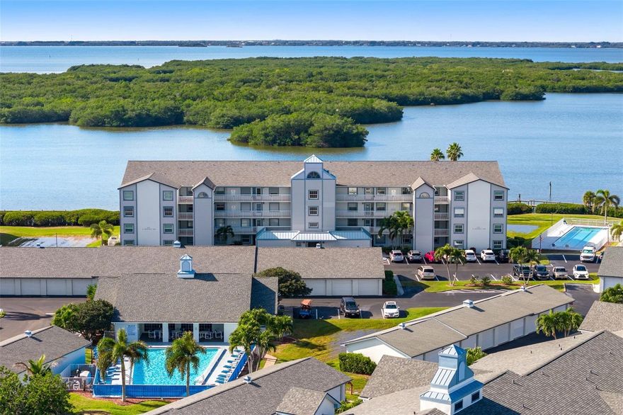 Seller is offering a generous $5000 concession for new carpet, giving the buyer flexibility to choose their preferred flooring. New HVAC and water heater. Experience the best of waterfront living in this beautifully maintained 2-bedroom, 2-bath riverfront condo in the heart of Cocoa Beach. Perfectly positioned along the tranquil Banana River, this residence offers stunning sunset views and refreshing coastal breezes right from your screened in porch. Inside, you’ll find a spacious and thoughtfully designed layout with an open living and dining area ideal for entertaining or relaxing after a day at the beach. The primary suite features water views, generous closet space, and an en-suite bath for added privacy and comfort. A well-appointed guest bedroom and full bath provide flexibility for visitors or a home office.
One of the standout features is the private garage — a rare and valuable amenity in beachside communities — offering secure parking and extra storage for bikes, kayaks, or beach gear. Electric hurricane shutters on porch and primary bedroom window.  Manual shutters on front windows.  The unit is completely secured for hurricane season. 
Residents enjoy access to an impressive array of amenities designed to enhance both lifestyle and long-term value, including multiple pools, tennis and pickleball courts, a clubhouse, fitness center, boat and RV storage area, and beautifully maintained grounds. Whether you prefer kayaking on the river, lounging poolside, or strolling to nearby dining and shopping, this location delivers the ultimate Cocoa Beach lifestyle. And just step outside to watch the rocket launches, one of the highlights of living in Cocoa Beach!. 
Live where others vacation — riverfront, relaxed, and ready to enjoy. Come take a personal tour. See what the Cocoa Beach life is ALL about!!