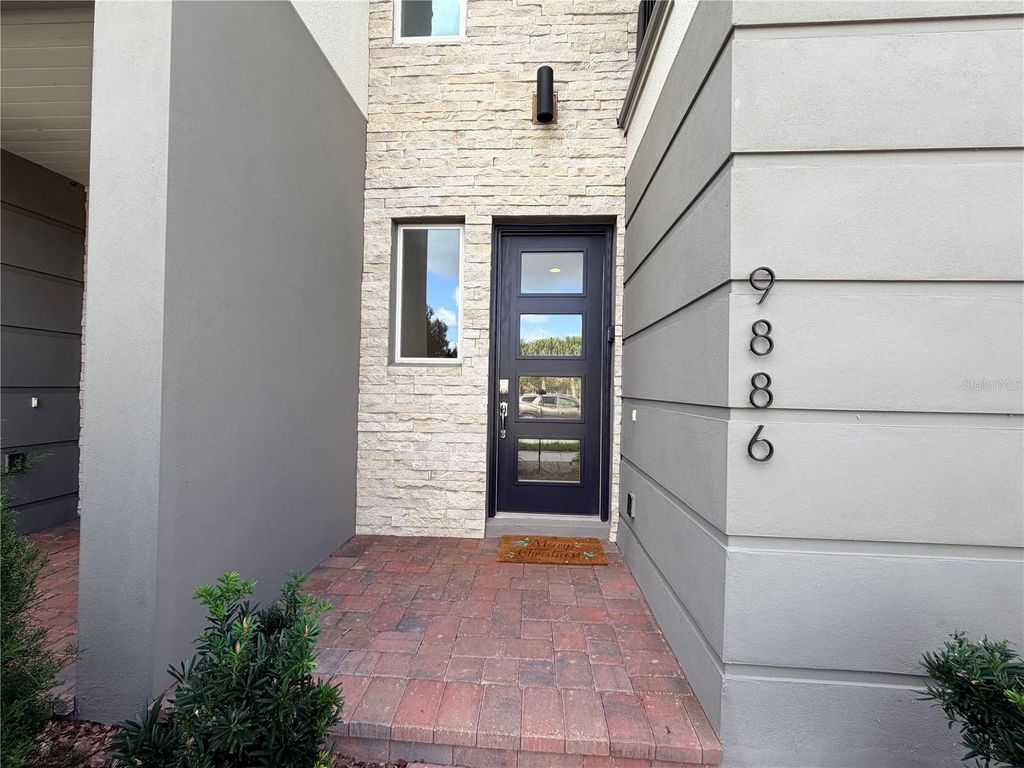 Photo of 9886 Bucklow Hill Drive, Orlando, FL 32832 (MLS # O6391390)