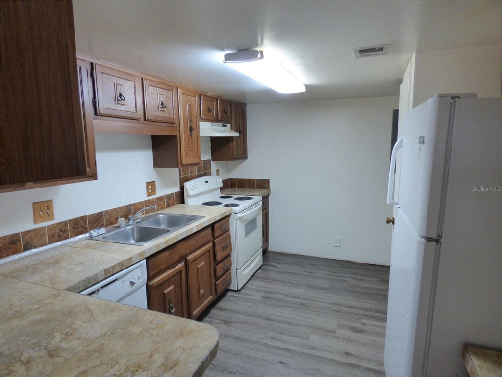 Photo of 4700 Jasmine Creek Lane #1512, Orlando, FL 32811 (MLS # O6407528)