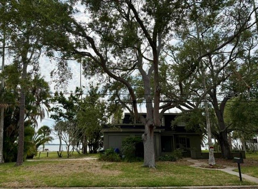 Under contract-accepting backup offers. One of the few double lots on Santa Barbara Dr.  Design and build your dream home with magical sunsets to the rear and swaying Washingtonia Palms to the front.