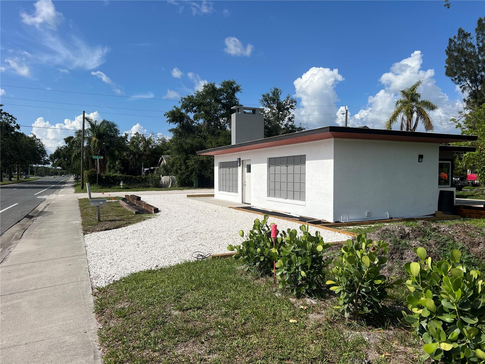 Multiple possibilities exist for development on this parcel with approximately 2.14 Acres in ideal location, with close proximity to downtown Sarasota, International Airport, and UTC Mall. The property has two existing single, family homes on the site that has the potential to produce over $4000 a month in combined gross rental income. One of the homes boarders on Lockwood Ridge Road with the 2nd home adjacent to the front home, on a side road known as 42nd Street. Past the two homes is a large open space inclusive of the existing homes which boarders the back of Fire Department. This large, open (private) space is wooded with recent flood maps showing a good report for the site. Overall the entire parcel has many options. Such possibilities could be to keep the property as it currently exists, to be used as one large private homesite or divide the property for multiple residences.