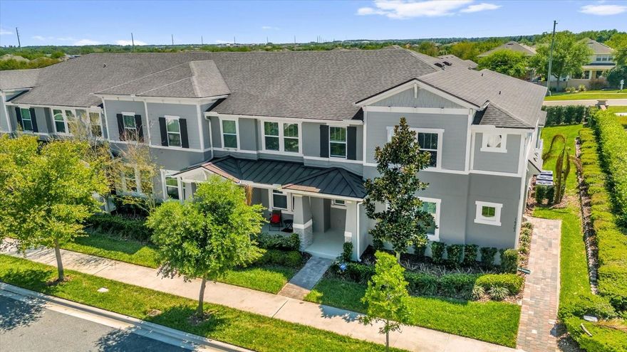 Located in the desirable Hawksmoor community in Winter Garden, this well-designed two-story townhome offers a functional layout paired with clean, move-in ready finishes. The main level features a defined entry leading into a dining space that flows into a spacious kitchen equipped with granite countertops, stainless steel appliances, and an oversized island ideal for everyday use and entertaining. The kitchen opens directly to the gathering room, creating a natural connection between spaces while maintaining distinct areas. Just off the living area, a private paver courtyard provides a low-maintenance outdoor setting, perfect for relaxing evenings or hosting guests. Upstairs, the primary suite features a tray ceiling, generous layout, and a well-appointed en suite bath with dual sinks, granite counters, and a glass-enclosed shower. Two additional bedrooms offer flexibility for guests, a home office, or everyday living and share a full bath. Residents of Hawksmoor enjoy access to a clubhouse, community pool, splash pad, fitness center, playground, and a recreational field with full-sized soccer goal posts, enhancing the overall lifestyle experience. Conveniently located near shopping, dining, major roadways, and everything Winter Garden has to offer, this home delivers comfort, convenience, and a strong sense of community.