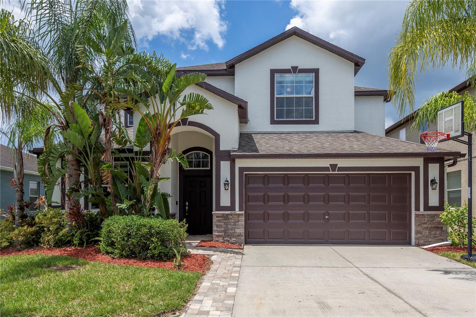 This five-bedroom, three-bathroom house offers approximately 3,210 square feet of living space. The property features a refreshed exterior with a fresh coat of paint, providing a welcoming first impression. The two-story layout includes five bedrooms, along with an additional loft area, allowing for flexible use of the available space. The fenced-in yard surrounding the home provides a secure outdoor space, great for enjoying the property's amenities, including the in-ground pool. The pool offers a refreshing retreat and can serve as a gathering place for recreational activities or relaxation. The well-appointed interior boasts ample room for comfortable living, with generously sized bedrooms and living areas. The primary bedroom provides a serene retreat, while the additional four bedrooms offer flexibility for a variety of uses, such as guest accommodations, home offices, or additional living spaces. The three bathrooms are conveniently located throughout the home, ensuring everyone has access to the necessary facilities. The overall layout and design of the property create a harmonious and functional living environment. All measurements and information deemed accurate, Buyer should verify. Active exterior video and audio recording via Ring doorbell in use.