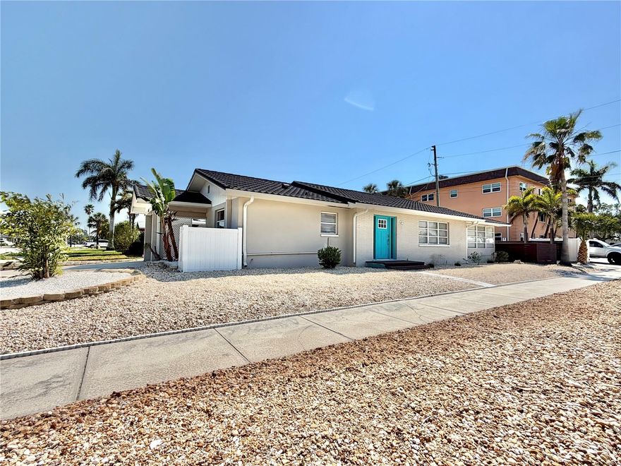 Endless Beach Days & Retro Coastal Vibes Await in St. Pete Beach! Welcome to your mid-century beachside retreat—a masterfully renovated oasis just 100 steps from the sugar-white sands, complete with deeded beach access. This 2-bedroom, 2-bathroom home perfectly captures the iconic 1960s coastal charm that keeps everyone coming back to St. Pete Beach. If you’ve been searching for turnkey, you’ve found it. The home can be offered fully furnished with an acceptable offer, and the freshly updated landscaping—with clean rock accents—adds to the effortless curb appeal. Inside, 1,494 square feet of coastal elegance unfolds with a light-filled, open-concept layout designed for both relaxation and entertaining. The modern kitchen features brand-new appliances, a striking single onyx sink with a touchless sensor faucet, and sleek, updated cabinetry.

The open, airy floor plan flows seamlessly from the living space into the sunroom—perfect for unwinding after a day at the beach or hosting guests with ease. A split-bedroom design offers ideal privacy, while both bathrooms have been thoughtfully updated with spa-inspired finishes, including rainfall showerheads and contemporary vanities.
.......................................................................................................................................................................................................

The indoor laundry room adds everyday convenience with a new water heater, brand-new washer and dryer, and additional storage. Step outside to your private patio, ready to be transformed into your own outdoor oasis. A covered carport with an EV Charger and two storage closets provides added functionality, while the outdoor shower offers direct access into the primary bathroom—making post-beach living effortless.

Beyond its beauty, this home delivers true peace of mind with a newer tile roof (2022), brand-new AC (2025), and fully owned solar panels (2022), keeping energy costs impressively low.Living here is about more than just the home—it’s a lifestyle. Take advantage of the Freebee ride service for complimentary, on-demand transportation to nearby hotspots like Pass-a-Grille and Blind Pass, where dining, shopping, and entertainment await—no car needed. For those seeking an elevated resort-style experience, residents have the option to explore membership opportunities at the iconic The Don CeSar. Through its exclusive Don Club, members can enjoy access to a private fitness center, daily classes, resort-style pools, beach loungers, spa perks, dining discounts, valet service, and curated social events—bringing a luxury resort lifestyle just moments from home.

With no HOA, close proximity to boat ramps and tennis courts, and a location near the iconic The Don CeSar, this property offers the perfect blend of luxury, convenience, and coastal charm. Whether you're searching for a full-time residence, vacation home, or investment opportunity, this is a rare find.

Just bring your flip-flops—your coastal sanctuary is ready.