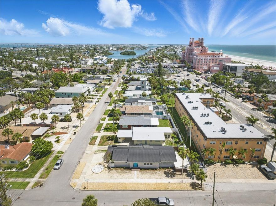 Endless Beach Days & Retro Coastal Vibes Await in St. Pete Beach! Welcome to your mid-century beachside retreat—a masterfully renovated oasis just 100 steps from the sugar-white sands, complete with deeded beach access. This 2-bedroom, 2-bathroom home perfectly captures the iconic 1960s coastal charm that keeps everyone coming back to St. Pete Beach. If you’ve been searching for turnkey, you’ve found it. The home can be offered fully furnished with an acceptable offer, and the freshly updated landscaping—with clean rock accents—adds to the effortless curb appeal. Inside, 1,494 square feet of coastal elegance unfolds with a light-filled, open-concept layout designed for both relaxation and entertaining. The modern kitchen features brand-new appliances, a striking single onyx sink with a touchless sensor faucet, and sleek, updated cabinetry.

The open, airy floor plan flows seamlessly from the living space into the sunroom—perfect for unwinding after a day at the beach or hosting guests with ease. A split-bedroom design offers ideal privacy, while both bathrooms have been thoughtfully updated with spa-inspired finishes, including rainfall showerheads and contemporary vanities.
.......................................................................................................................................................................................................

The indoor laundry room adds everyday convenience with a new water heater, brand-new washer and dryer, and additional storage. Step outside to your private patio, ready to be transformed into your own outdoor oasis. A covered carport with an EV Charger and two storage closets provides added functionality, while the outdoor shower offers direct access into the primary bathroom—making post-beach living effortless.

Beyond its beauty, this home delivers true peace of mind with a newer tile roof (2022), brand-new AC (2025), and fully owned solar panels (2022), keeping energy costs impressively low.Living here is about more than just the home—it’s a lifestyle. Take advantage of the Freebee ride service for complimentary, on-demand transportation to nearby hotspots like Pass-a-Grille and Blind Pass, where dining, shopping, and entertainment await—no car needed. For those seeking an elevated resort-style experience, residents have the option to explore membership opportunities at the iconic The Don CeSar. Through its exclusive Don Club, members can enjoy access to a private fitness center, daily classes, resort-style pools, beach loungers, spa perks, dining discounts, valet service, and curated social events—bringing a luxury resort lifestyle just moments from home.

With no HOA, close proximity to boat ramps and tennis courts, and a location near the iconic The Don CeSar, this property offers the perfect blend of luxury, convenience, and coastal charm. Whether you're searching for a full-time residence, vacation home, or investment opportunity, this is a rare find.

Just bring your flip-flops—your coastal sanctuary is ready.