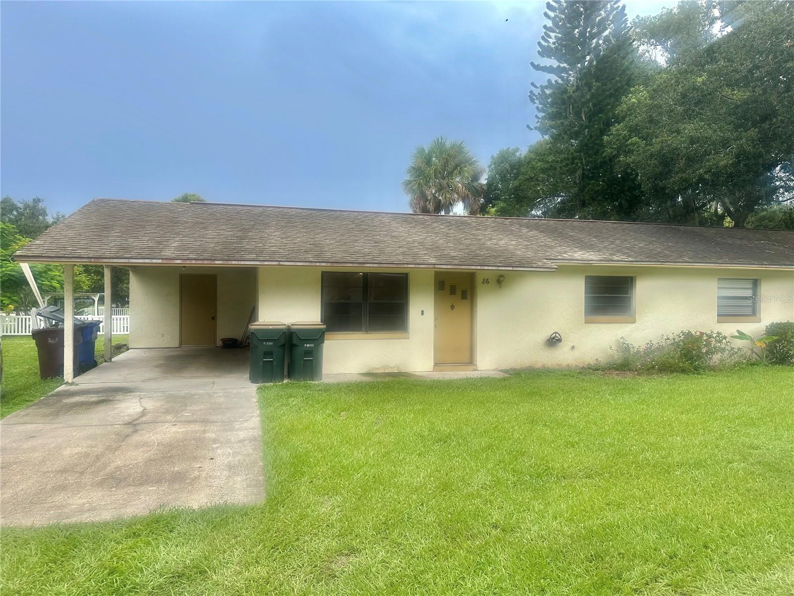 Ideally located 7 blocks from the very popular St Cloud Lakefront Recreational Park with sandy beach,swimming,boat ramps, marina,Kidde water park,picnic table pavilions,barbecue grilles,fishing docks, and more. Close to schools and everything on Rt 192. Clean 2 bed 1 bath with new paint, ceramic tile floors, inside laundry room and attached covered carport.