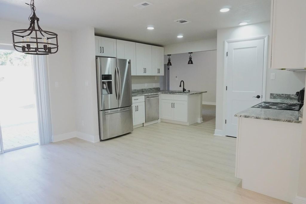 Photo of 7811 Bay Cedar Drive, Orlando, FL 32835 (MLS # O6374851)