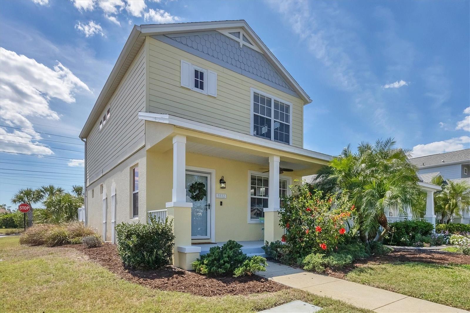 One or more photo(s) has been virtually staged. Located in the charming River Sound community along the scenic Braden River, this beautifully maintained corner-lot home offers the perfect blend of style and convenience. The inviting front porch overlooks a picturesque tree-lined boulevard, enhancing its curb appeal, while the alley-accessed two-car garage keeps the front clean and welcoming. Inside, this two-story home features two spacious bedrooms upstairs, each with its own ensuite bath and walk-in closet, ensuring comfort and privacy. A convenient half bath downstairs and dedicated laundry room adds to the home's functionality. Recent updates include a BRAND-NEW ROOF (2025), NEW A/C (2024), FRESHLY PAINTED EXTERIOR (2025) and NEW CARPETING on the stairs. The home also features tinted windows, adding energy efficiency and privacy. Enjoy outdoor living in the private vinyl-fenced backyard, perfect for relaxation, entertaining, and four-legged friends. River Sound also offers fantastic community amenities, including a gated entrance, pool and hot tub, a playground, two dog parks, and a boardwalk leading to the scenic Braden River.