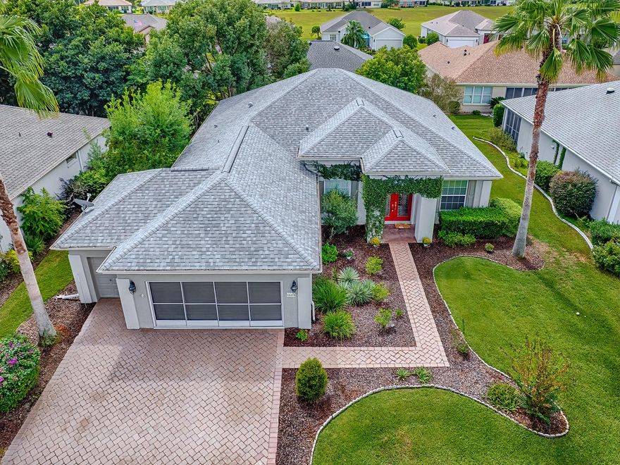 Welcome to Del Webb Spruce Creek Golf & Country Club, a charming 55-plus gated community perfectly situated along the sought-after 441 corridor. This location offers a gateway to a host of adventures, whether you're taking a quick trip on the interstate, visiting the renowned World Equestrian Center in Ocala, enjoying a day out on the tranquil Lake Weir, or indulging in the vibrant entertainment and diverse facilities of The Villages nearby. Everything you need is just a short distance away, enhancing the allure of this delightful golf community. That's not all that there is to offer of course with a fantastic restaurant to attend, indoor and outdoor pools, community centers that hold a wide variety of activities, fitness centers, baseball field, tennis, walking trials dog parks and so much more.

With its exceptional curb appeal, this home invites you to experience its beauty and luxury. It features meticulously landscaped gardens, a striking brick paver driveway, and an elegant block-and-stucco exterior, all accented by a majestic double-door entrance framed by stately palm trees. The tandem golf cart garage that pairs with the already spacious garage is sure to catch your attention. When you are thinking of savings, the 2024 roof will keep the figures where they belong or leave plenty of room in the budget for the beautiful decor you want to outfit this spectacular home.

Come inside to discover this Johnstown model that exemplifies an incredibly functional floor plan. The inviting entry foyer opens into a cozy front den and a formal dining room, seamlessly flowing into a spacious living area designed for comfort and warmth. The heart of the home, the kitchen, boasts a center island and an abundance of cabinetry, making it a perfect hub for hosting memorable gatherings. Privacy is ensured through a smartly designed split-bedroom layout, with the guest area thoughtfully separated from the main living spaces and from each other as well. The addition of crown molding enhances the grandeur of the high ceilings, while luxury vinyl plank flooring adds an elegant modern touch to this stunning residence.

Embrace the outdoors in style with a generously extended lanai, providing a versatile space for entertaining. It opens into an initial enclosed zone, which then leads to a covered, screened lanai, allowing you to enjoy fresh air while staying sheltered from the elements.

This home is truly a must see...there is so much that it offers to even the most scrutinizing person. Be sure to make an appointment to experience all of the ways it will be perfect for you.