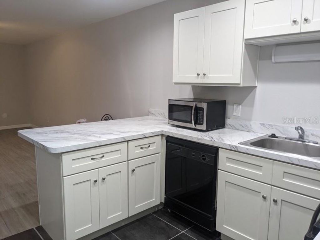 Photo of 165 Windtree Lane #U, Winter Garden, FL 34787 (MLS # O6392506)