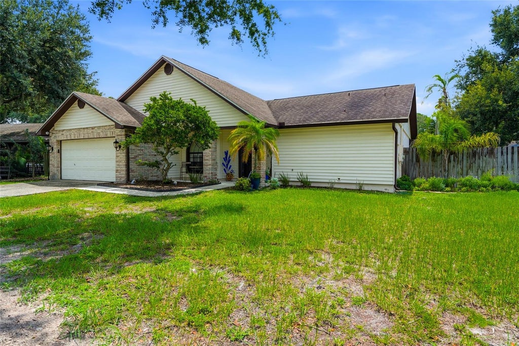 Photo of 1150 Windsor Way, Lutz, FL 33559 (MLS # TB8533215)