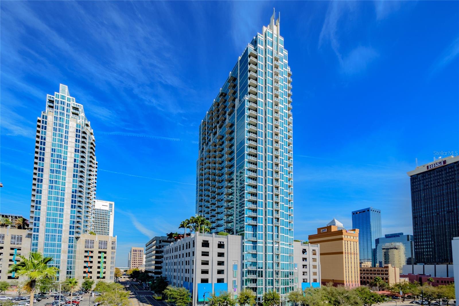 DOWNTOWN TAMPA 1/1 WITH INCREDIBLE VIEWS! - DOWNTOWN TAMPA! LIMITED SUPPLY, at SKYPOINT with the BEST SOUTH FACING VIEWS in the building ! This RARE condo is located on the 16th Floor with Soaring, Unobstructed Views of the Tampa Bay, Downtown Skyline, Hillsborough River, Curtis Hixon Park, and Glazers Museum. You will feel suspended in the sky with panoramic views through the floor-to-ceiling, tinted, dual pane glass windows. This one bedroom, one bathroom condo has 685 sf of gracious living space, a substantial balcony, and one assigned parking space with stainless steel appliances and granite countertops throughout. Your future home is centrally located near the Water Street development, Harbour Island, Channelside, Davis Island, Hyde Park, and just seconds away from Armature Works, the Cultural Arts District, Tampa Art Museum and Glazer Children's Museum, Amalie Arena, and the Convention Center. For those that love the outdoors or enjoy a good walk next to dolphins or manatees, the Riverwalk, and Bayshore are steps away. For the foodies, this condo drops you right in the center of ALL 5 of Tampa's Michelin Star restaurants plus dozens more within blocks of your front door. Community amenities include 24-hour concierge, controlled building access, 2 state-of-the-art gyms, a recently updated lap pool with Restoration Hardware pool furniture, hot tub, outdoor terrace with new fire pits, gas grills, and a massive pergola. Spend time entertaining firends and loved ones in the movie theatre or lounge area that over looks Curtis Hixon which includes a pool table, clubroom with catering area, and secured fob access. HOA fees include internet, one reserved parking space, trash, and tons of services from your on-site concierge and property management teams. Call to schedule your private showing today!