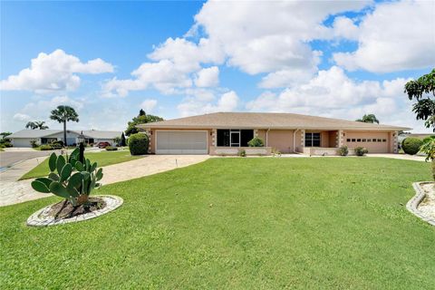 Photo of 1010 Yellowbird Place, Sun City Center, FL 33573 (MLS # TB8431593)