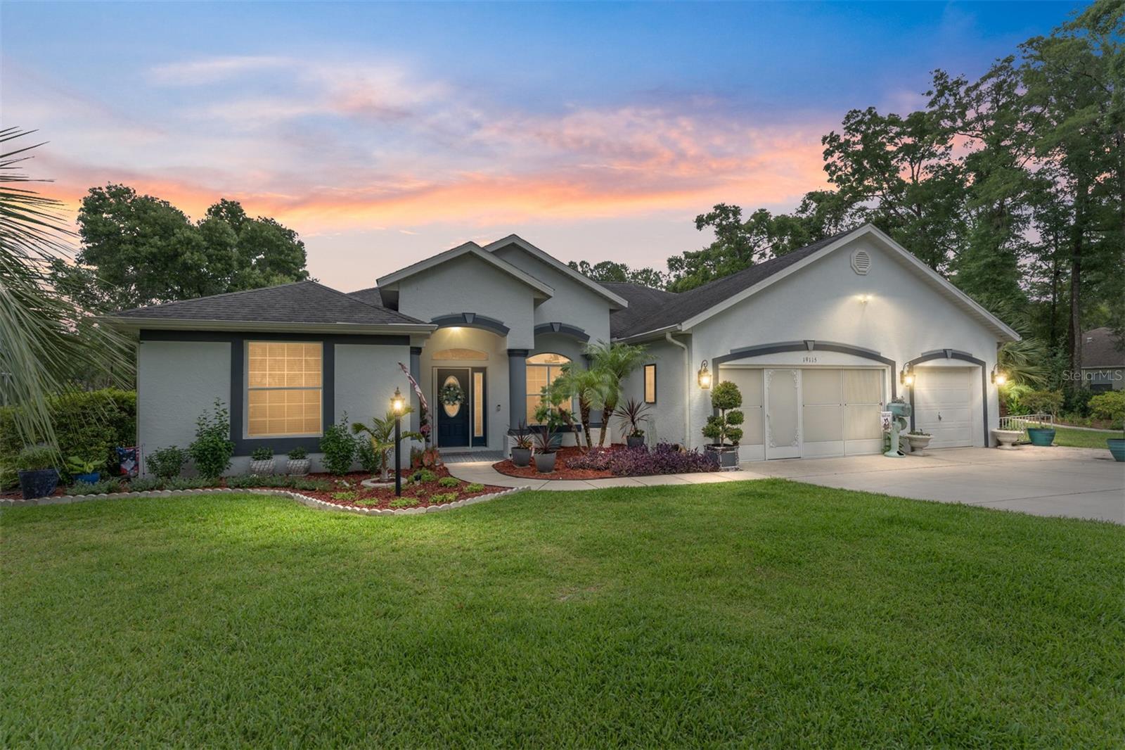 THIS SPECTACULAR 3/2/3 POOL HOME HAS PRIVACY IN THE BACK WITH THE ADDED BONUS OF AN INCLUDED ADJACENT VACANT LOT! ***FULLY PAID-OFF ELECTRIC SOLAR PANELS will help keep your monthly utility costs around an average of $100/month!***. Where comfort, nature, and community charm come together, this spacious home is located in the sought-after Rainbow Springs Country Club Estates and has DIRECT ACCESS TO THE RAINBOW RIVER - just another added bonus to this peaceful retreat in Dunnellon, FL.
Out front, enjoy a friendly neighborhood ideal for walking, biking, and dog-friendly strolls. Out back, your private oasis opens to a large, county-maintained greenbelt framed by mature trees. Watch deer, wild turkey, and even the occasional bald eagle from your own backyard.
Inside, you will see why this split floor plan was the community’s top-selling model. The home features an expansive open-concept layout that seamlessly connects the kitchen, dining, and living areas, all bathed in natural light from six oversized 8-foot sliding glass doors. Step outside to the screened lanai and enjoy your private in-ground pool, solar-heated for year-round enjoyment. The spacious primary suite includes dual walk-in closets, a luxurious bath with double vanities, a garden tub, a walk-in shower, and a private water closet. The second bath conveniently opens to the pool area for easy access. Residents of this vibrant community enjoy exclusive access to a private Rainbow River park with a sandy beach, kayak launch, picnic areas, and restrooms. The community center offers a pool, tennis courts, a fitness center, billiards, and scenic walking paths. Located just minutes from grocery stores, restaurants, and Walmart, and with easy access to Crystal River, the Gulf Coast, the World Equestrian Center, and the Orlando and Tampa-area attractions, this home truly offers the best of all worlds. Don’t miss your chance to live in a nature lover’s paradise with modern conveniences at your doorstep.