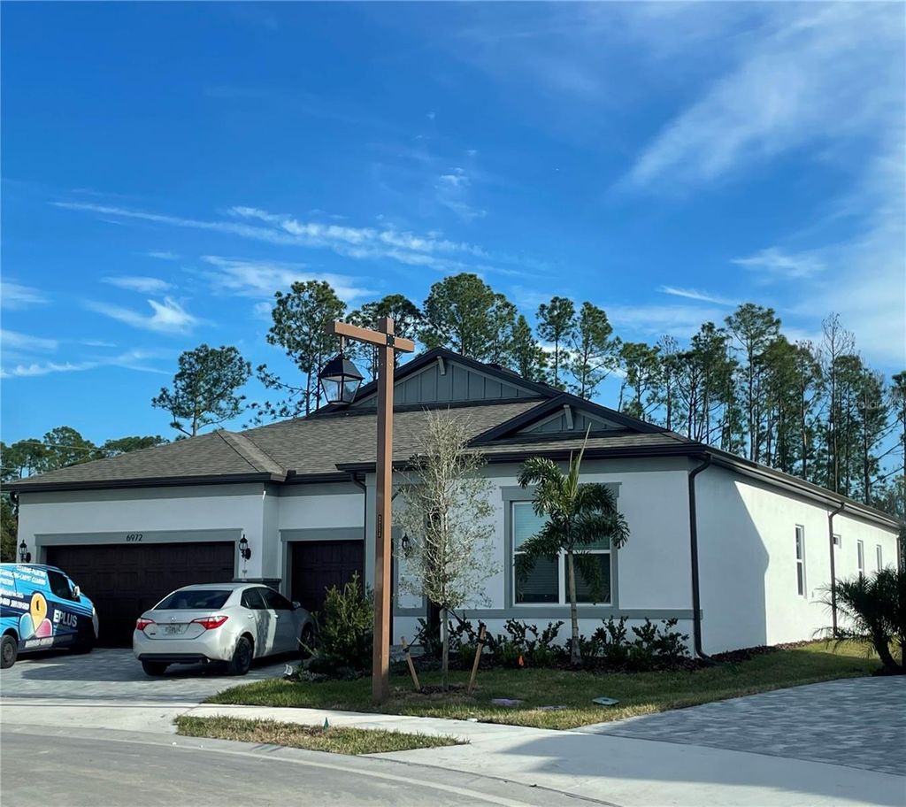 Photo of 6972 Gilly Shadow Street, Wesley Chapel, FL 33545 (MLS # J995650)