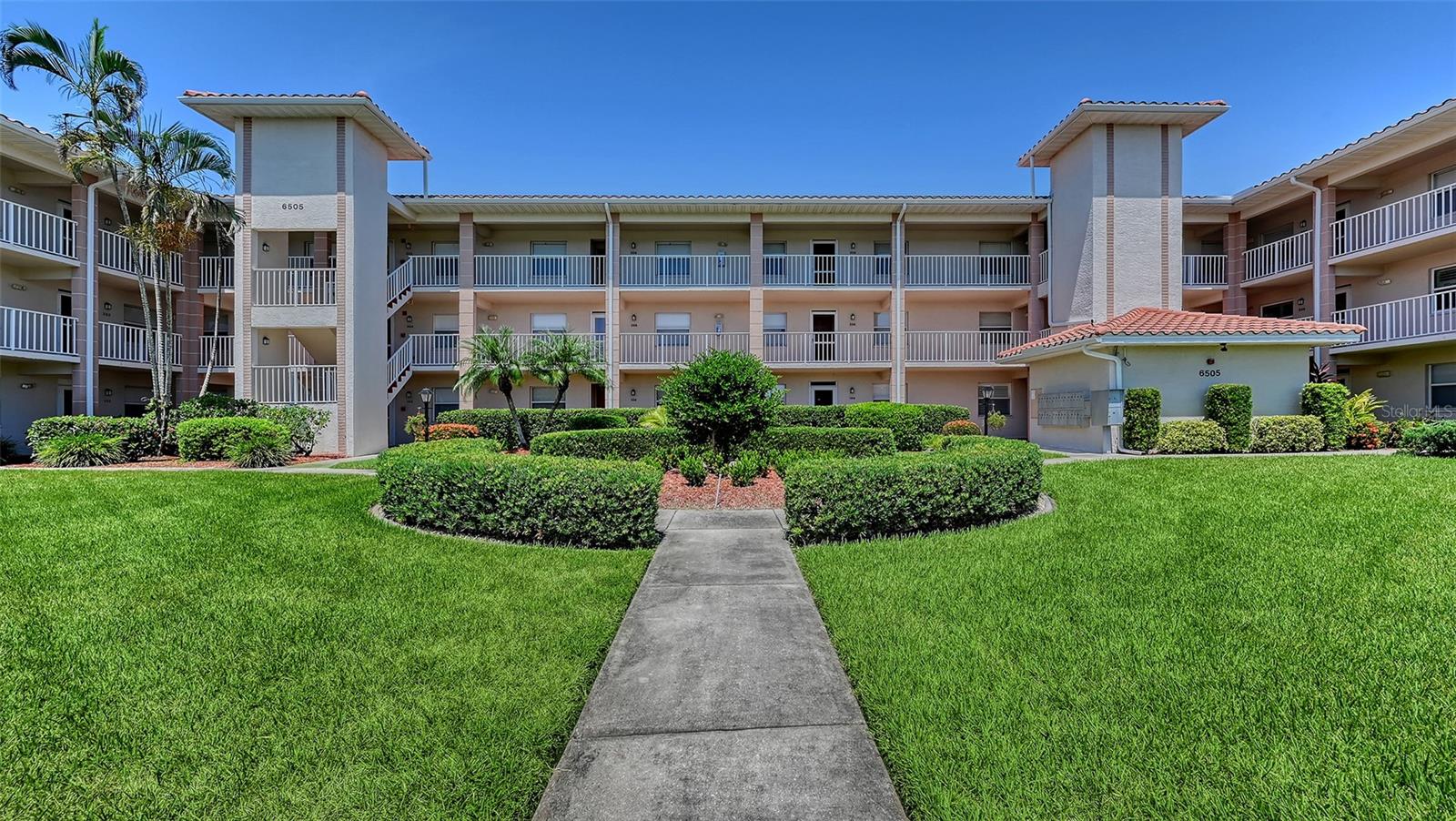 This meticulously updated second-floor condo includes a Class A Golf Membership to the highly sought-after Tara Golf & Country Club, where you'll enjoy immediate access to a newly renovated 18-hole championship course, resort-style amenities, and an active social scene. Whether you're an avid golfer or simply looking for a vibrant, amenity-rich community, Tara is the place to be.
Step inside to find a beautifully updated kitchen featuring a brand new composite double-sink, MOEN faucet, and garbage disposal, along with new quartz countertops and a marble backsplash. The adjacent dinette/bar area includes custom soft-close cabinetry and drawers, a built-in lazy Susan, and matching quartz surfaces and backsplash - a perfect blend of function and style, making entertaining guests easy.
The spacious layout includes a primary suite with direct lanai access and sweeping golf course views, along with a large walk-in closet with custom built-ins and ensuite primary bath. The guest bedroom and updated second bath are located on the opposite side of the unit for added privacy. Both bathrooms feature spacious walk-in showers. The open living area offers ample space to relax or host friends, and the laundry closet includes built-in shelving for added storage.
Enjoy peace of mind with electric hurricane shutters enclosing the lanai - ideal for locking up when traveling and for added strom protection.
Living in Tara means more than just golf. Residents enjoy two pools, a state-of-the-art fitness center, bocce ball, bridge, and new pickleball courts coming Fall 2025. After a day on the course, or at the pool, unwind at the Grill Room or meet friends for cocktails at the Club’s lively gathering bar.
Tara is perfectly located just off I-75, minutes from UTC Mall, Sarasota Airport, Lakewood Ranch Main Street, and the Tampa/St. Pete metro area.
This thoughtfully updated condo offers the perfect blend of comfort, location, and resort-style living with golf at your doorstep.