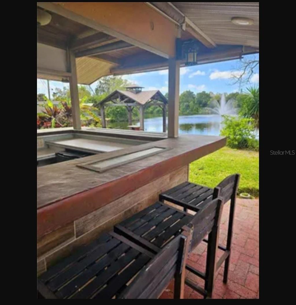 Photo of 5564 N 63rd Way N, St Petersburg, FL 33709 (MLS # TB8480979)