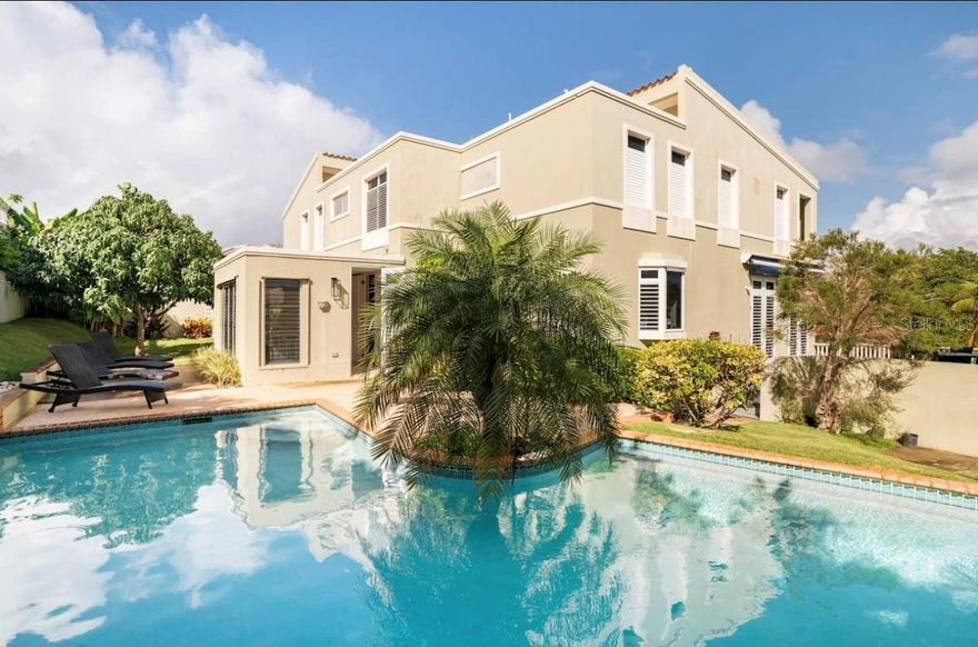 Charming house nestled in the heart of Palmas Del Mar, Humacao, Puerto Rico! This inviting retreat offers a perfect blend of comfort and convenience, ideal for families. Enjoy the refreshing outdoor pool, relax on your private patio, and take advantage of easy beach access. With amenities like air conditioning, a fully equipped kitchen, and modern comforts, it ensures a seamless and enjoyable stay. Explore nearby attractions, from stunning beaches to exciting activities, making it a perfect base for your family.