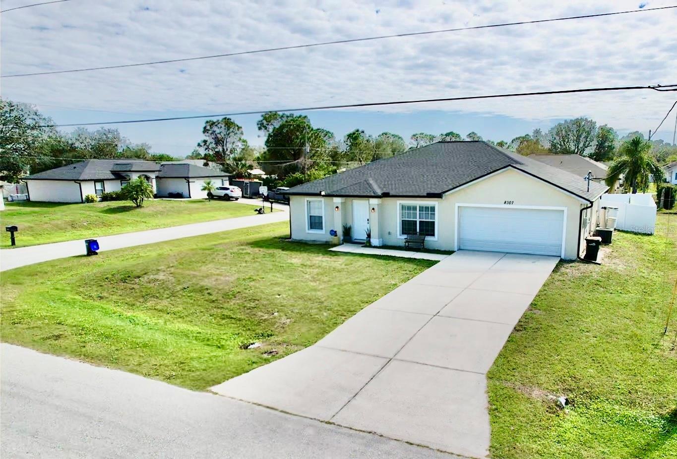This 3 Bedroom, 2 Bathroom home has much to offer! Newer Roof- 2023, Newer HVAC -2021, New Fencing-2024, New Appliances -2024, New Vinyl Flooring in Bedrooms and Living room-2023, New Solar Panels- 2024, Newer Gutters- 2023, New Pressure Tank for well! Newer Exterior & partial Interior Paint! Tastefully decorated interior with a split floor plan, open kitchen and Lanai located near dining room. Come and bring the family and make this house your home! The solar panels are a great addition because of your lower monthly power costs!!!
