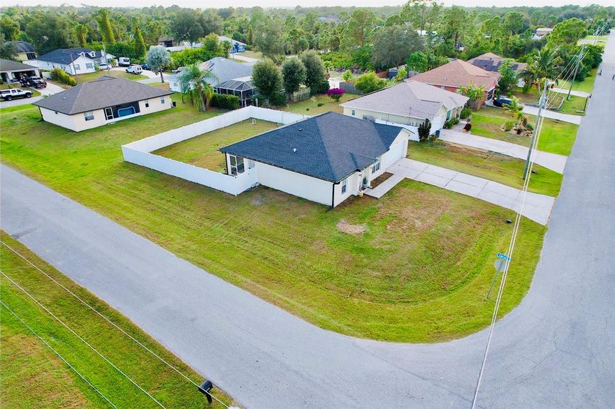 Spacious 3 Bedroom, 2 Bathroom home located on a generous corner lot! This cozy home has so much to offer! NEWER HVAC system 2021, NEW media, salt well, and pressure tanks on well water system 2022-2024,  NEW roof and gutters 2023, NEW hurricane impact exterior front door 2023, NEW vinyl flooring throughout living space and bedrooms, NEW vinyl Fencing 2024, NEW stainless steel Samsung SMART Appliances 2024, NEW partial interior and full exterior paint job! This home is a split floor plan, with a large living area! Open kitchen and dining area. The beautiful vaulted ceilings add to this already spacious home! The huge fenced in backyard is the perfect space for the kids and/or pets to run! Located in a quiet neighborhood near local parks, shops, and easy access to I-75!