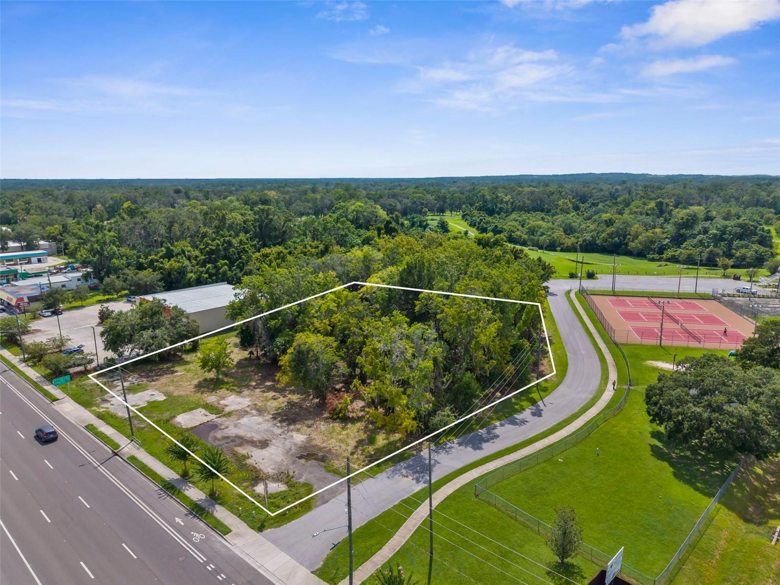 1.37 Acre Buildable Commercial Lot in the City of Brooksville on US 41 (S Broad Street). Zoned C2. 27,000 Annual Average Daily Traffic Count. Clean environmental report. Commercial Impact Fees Paid Already. Located near the City Park and tennis courts. 200 feet of frontage on US 41 (Broad Street). Additional road frontage on John Gary Grubbs Blvd. Allows for great visibility driving south on US 41 (Broad Street) as you approach the lot/location.