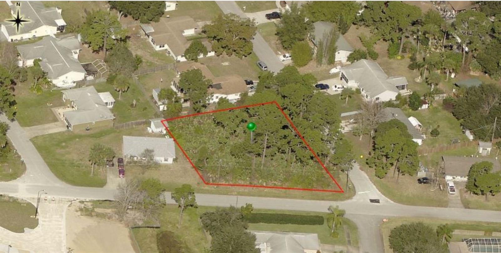 Great high and dry large buildable lot available in Florida Shores on the NW corner of Evergreen and 28th Street in established area. Walking distance to Whistle Stop park which includes a splash park, playground, a new skatepark, restrooms, improved lighting, a ½ mile walking trail, fitness kiosks, a volleyball court, a dog park, greenspace and new tennis courts, basketball courts, racquetball courts, & plenty of parking! A fantastic place to build your new family home.; Cleared: No