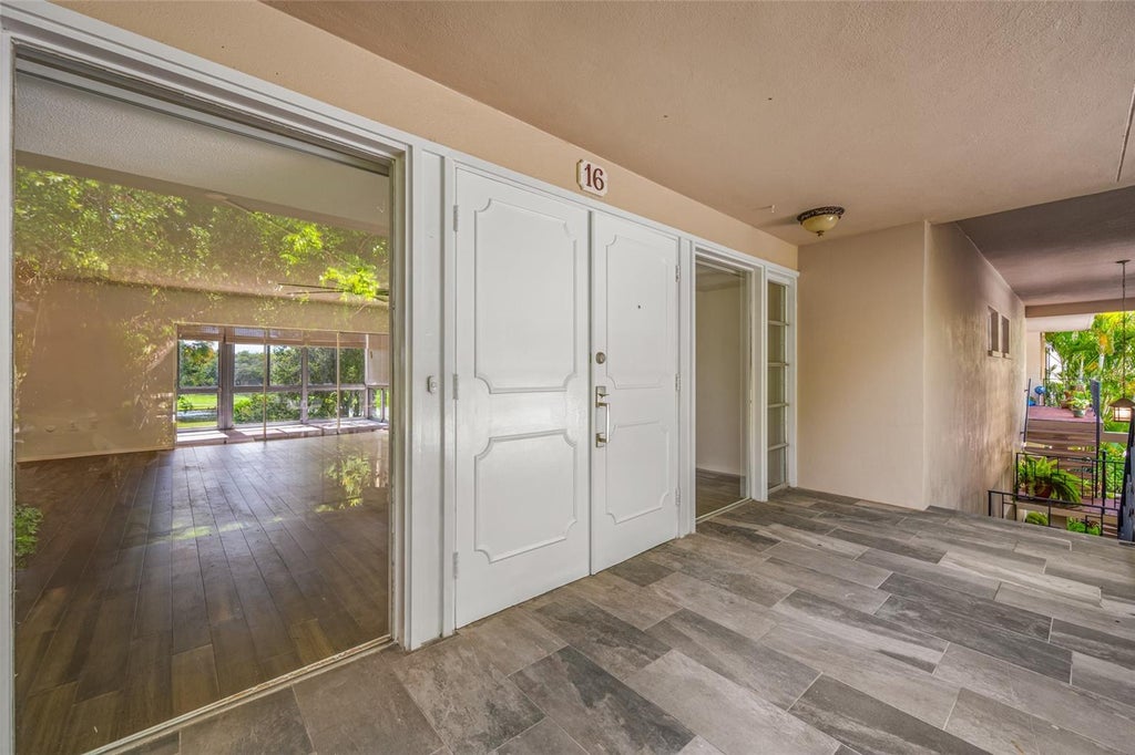 Photo of 16 Country Club Drive #16, Largo, FL 33771 (MLS # TB8546394)