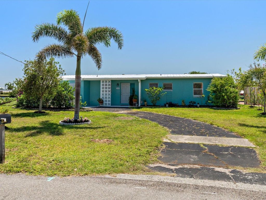 Photo of 21444 Higgs Drive, Port Charlotte, FL 33952 (MLS # C7508449)