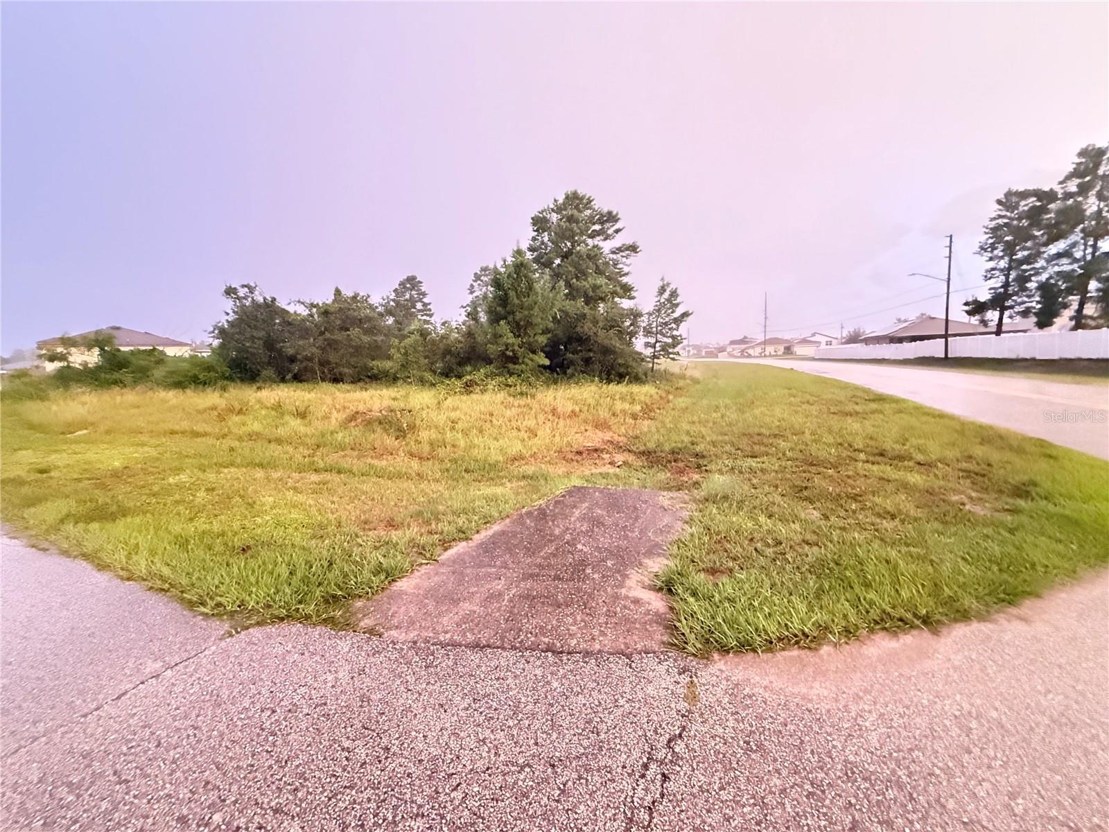 Build your dream home on this prime CORNER LOT in beautiful Poinciana! This spacious parcel sits high and dry, offering peace of mind and great curb appeal potential. Located at the corner of a quiet street in a growing community, you’ll enjoy easy access to schools, shopping, dining, medical facilities, and recreational amenities, including parks, walking trails, and sports courts. Part of the Association of Poinciana Villages (APV), residents have access to community pools, fitness centers, and year-round events. Conveniently situated near major highways for smooth commuting to Orlando’s theme parks, airport, and beaches. Don’t miss this opportunity to own a versatile, ready-to-build lot in one of Central Florida’s most sought-after areas.